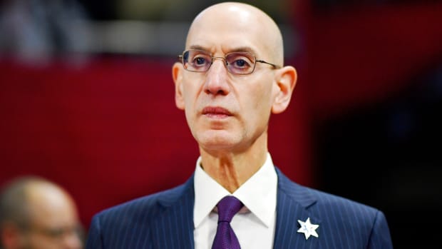 NBA Commissioner Adam Silver looks on during the NBA All Star-Celebrity Game at Wintrust Arena in Feb. 2020.
